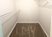 Thumbnail 8 of 25 - Empty walk-in closet with white shelving.