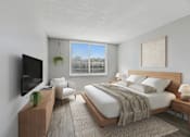 Thumbnail 8 of 22 - Large primary bedroom in updated apartment at Wilton Tower in Wilton Manors, Florida.