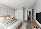 Thumbnail 9 of 22 - Renovated bedroom with large closet space at Wilton Tower apartments in Wilton Manors, FL.