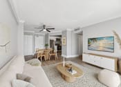 Thumbnail 5 of 22 - Bright living room in a renovated 2-bedroom apartment at Wilton Tower in Wilton Manors, FL.