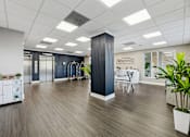 Thumbnail 19 of 22 - Modern leasing office and lobby entrance at Wilton Tower apartments in Wilton Manors, Florida.