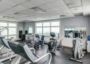 Thumbnail 31 of 48 - fitness center with cardio and weight equipment