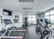 Thumbnail 30 of 48 - fitness center with cardio and strength training equipment