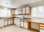 Thumbnail 24 of 48 - large kitchen with white appliances