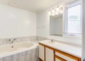Thumbnail 26 of 48 - bathroom with large soaking tub