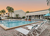 Thumbnail 13 of 23 - pool and sun deck at Woodlake Villas in Conway Orlando