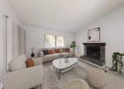 Thumbnail 9 of 17 - a living room with furniture and a fireplace