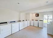Thumbnail 22 of 26 - laundry room at Southgate Apartments