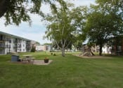 Thumbnail 20 of 22 - beautiful landscaping at Heritage Manor Apartments