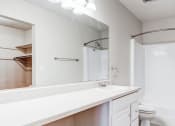 Thumbnail 7 of 15 - Modern apartment bathroom with tub