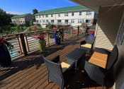 Thumbnail 10 of 20 - pool deck at apartment clubhouse