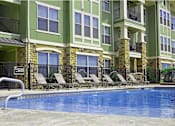 Thumbnail 20 of 25 - outdoor swimming pool at apartments