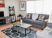 Thumbnail 4 of 28 - living room in The Gates of Rochester Apartments