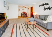 Thumbnail 9 of 20 - LIving room at Stone Grove apartments