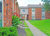 Thumbnail 1 of 27 - courtyard at Wake Robin Apartments