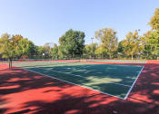 Thumbnail 16 of 22 - Tennis Court at Woodhollow Apartments