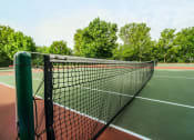 Thumbnail 17 of 22 - Tennis Court at apartment complex