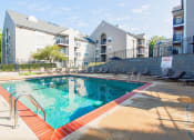 Thumbnail 18 of 30 - swimming pool at apartment complex