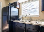 Thumbnail 9 of 25 - Longview apartments with nice kitchen