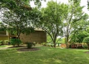 Thumbnail 20 of 22 - Landscaping at Woodhollow Apartments