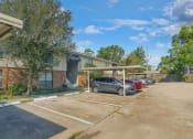 Thumbnail 12 of 15 - Dove Creek apartments with covered parking