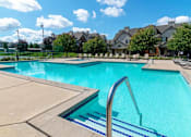 Thumbnail 18 of 33 - swimming pool at apartment complex