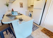 Thumbnail 5 of 18 - Breakfast bar at Castle Pointe Apartments