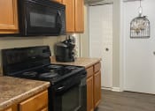 Thumbnail 2 of 17 - kitchen at Abbey Court Apartments