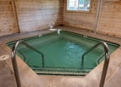 Thumbnail 25 of 31 - hot tub in apartment complex