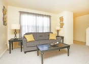 Thumbnail 1 of 16 - Living room at Golfview Village Townhomes
