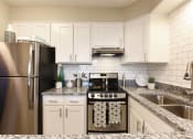 Thumbnail 6 of 21 - newly renovated kitchen at Icon Apartments