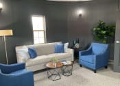 Thumbnail 11 of 17 - Abbey Court Apartments seating area in business center