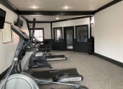 Thumbnail 8 of 17 - On-Site fitness center with treadmill