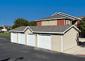 Thumbnail 21 of 32 - A two-car garage is attached to a house.