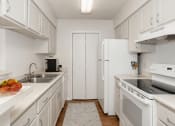 Thumbnail 30 of 33 - apartment kitchen with appliances