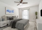 Thumbnail 26 of 33 - a bedroom with a bed and a ceiling fan
