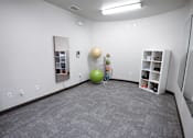 Thumbnail 13 of 20 - room with a green ball and a mirror in the corner