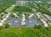 Thumbnail 27 of 27 - aerial view of a apartment community and trees