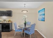 Thumbnail 4 of 27 - kitchen and dining area in apartment