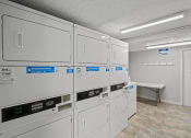 Thumbnail 20 of 27 - laundry room at apartment community