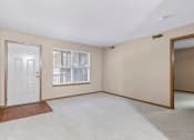Thumbnail 9 of 28 - a bedroom with a door and a window
