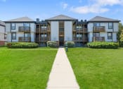 Thumbnail 25 of 28 - our apartments showcase a beautiful lawn