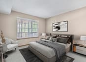 Thumbnail 4 of 28 - apartment bedroom with a large bed next to a window