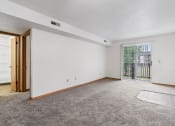 Thumbnail 8 of 28 - apartment living room with a sliding glass door to a balcony