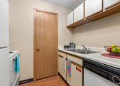 Thumbnail 3 of 28 - a kitchen with a sink and a dishwasher