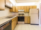 Thumbnail 7 of 30 - Kitchen at Fox Hill Glens Apartment
