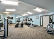 Thumbnail 19 of 35 - fitness center at River's Edge apartments