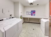 Thumbnail 18 of 35 - onsite laundry center at Madison WI apartments