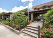 Thumbnail 21 of 25 - entrance to leasing office at acadian point apartments