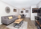 Thumbnail 1 of 25 - living room and dining room at acadian point apartments